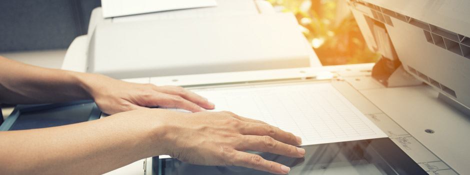 Woman scanning a document Scanning Services