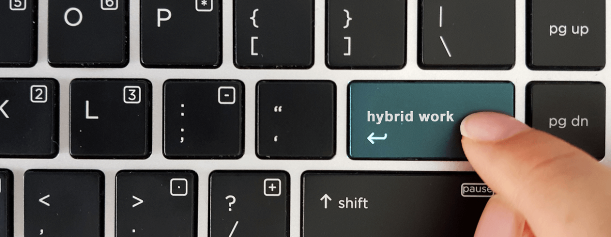 The words 'hybrid work' on keyboard key.